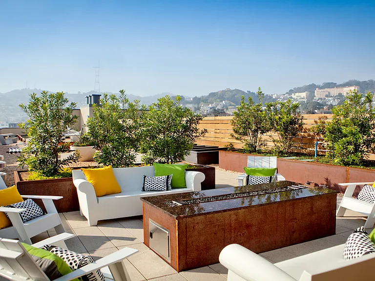 Rooftop seating with firepit and plenty of space for entertaining