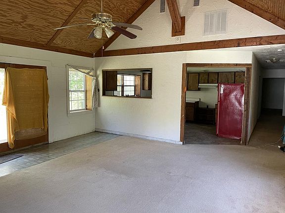 Living room looking into kitchen