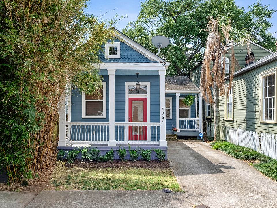 Front of house with parking spot