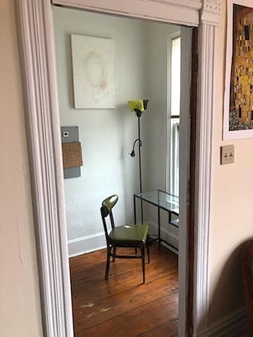 office off of the left of the front room overlooking street