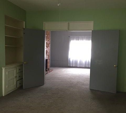 2 rooms as seen from the kitchen doorway
