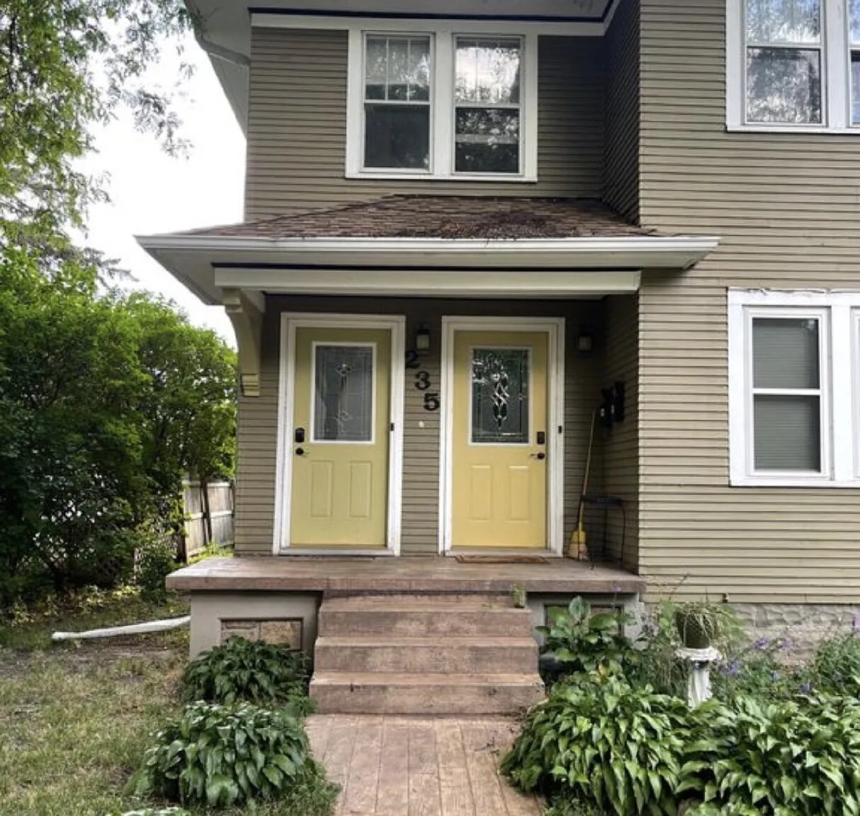Upper level duplex 2-Bed Duplex with Gleaming Hardwood Floors at 235 Logan Ave N #2, Minneapolis!" — Photo 1