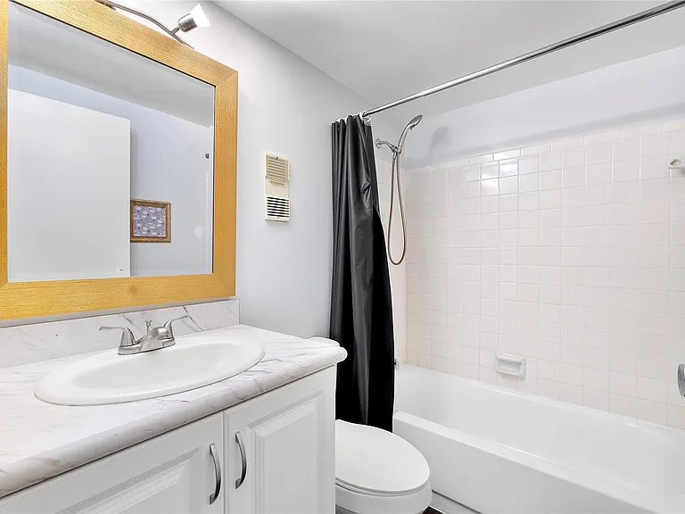 8437 Forest Hills Dr #203 — Photo 11
