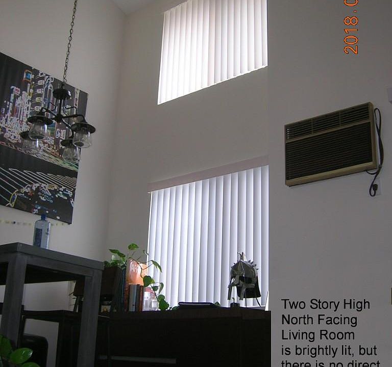 Living room is two stories high
