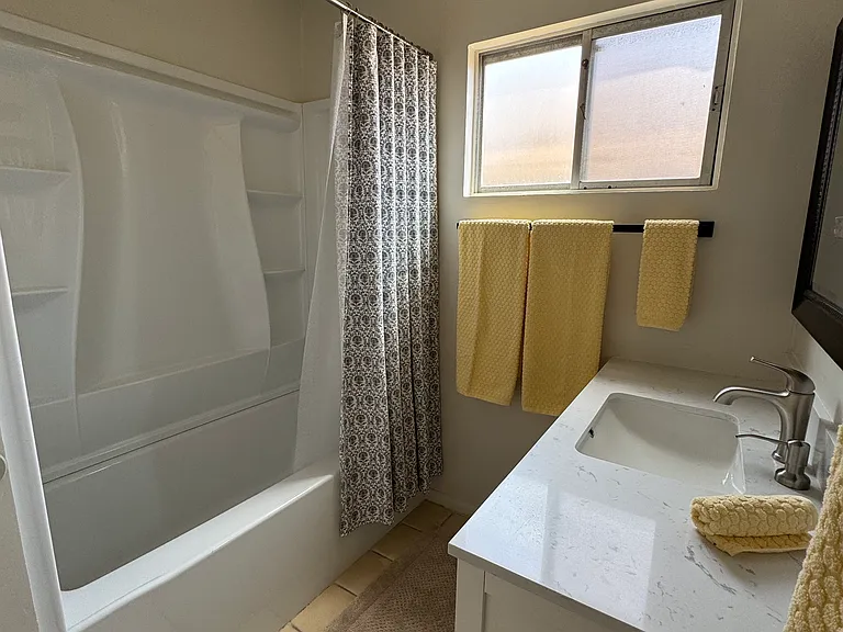 Shower and tub inclosure