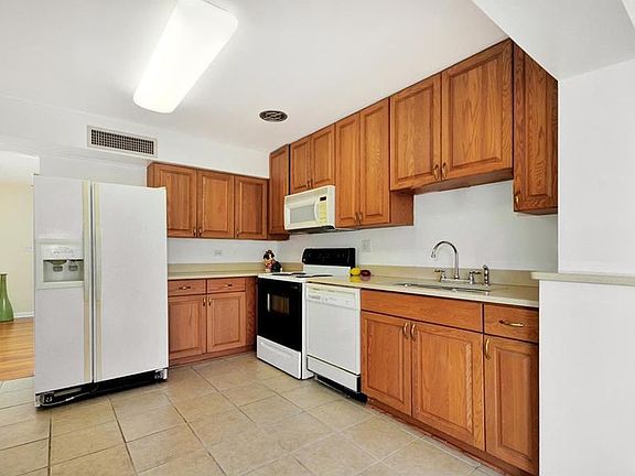 5th image of 4520 S Lois Ave