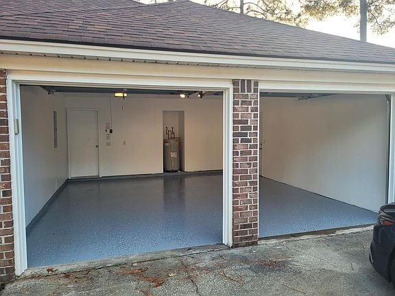 Finished and Floor Painted Garage with remotes and new Garage Doors