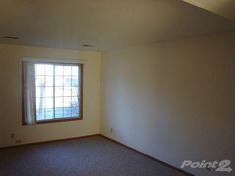 5405 - 45th Street Building Pics LR Kit with cream cabinets 001