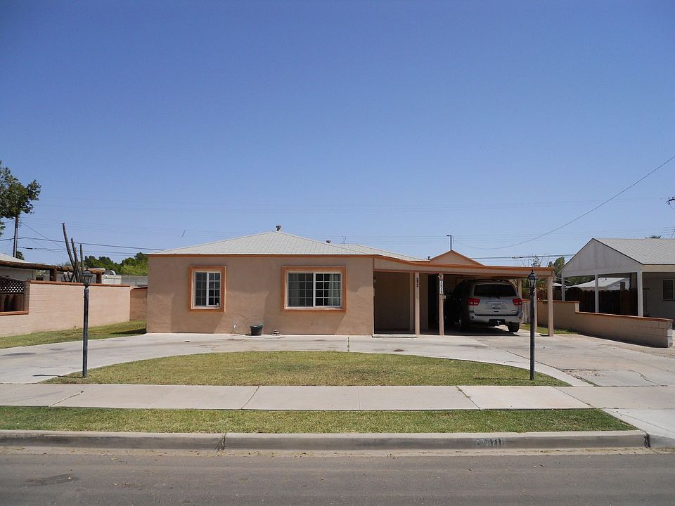 front of the house with circular driveway