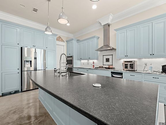 5th image of 7941 Saint Claude Dr