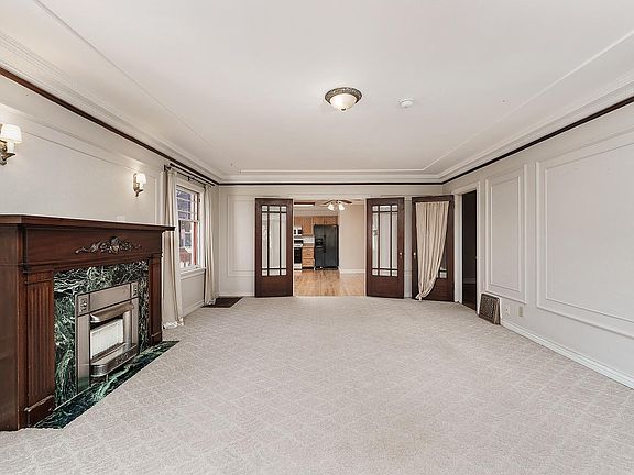 Living room, fireplace for decoration only. Flatscreen TV will sit on top of mantle.