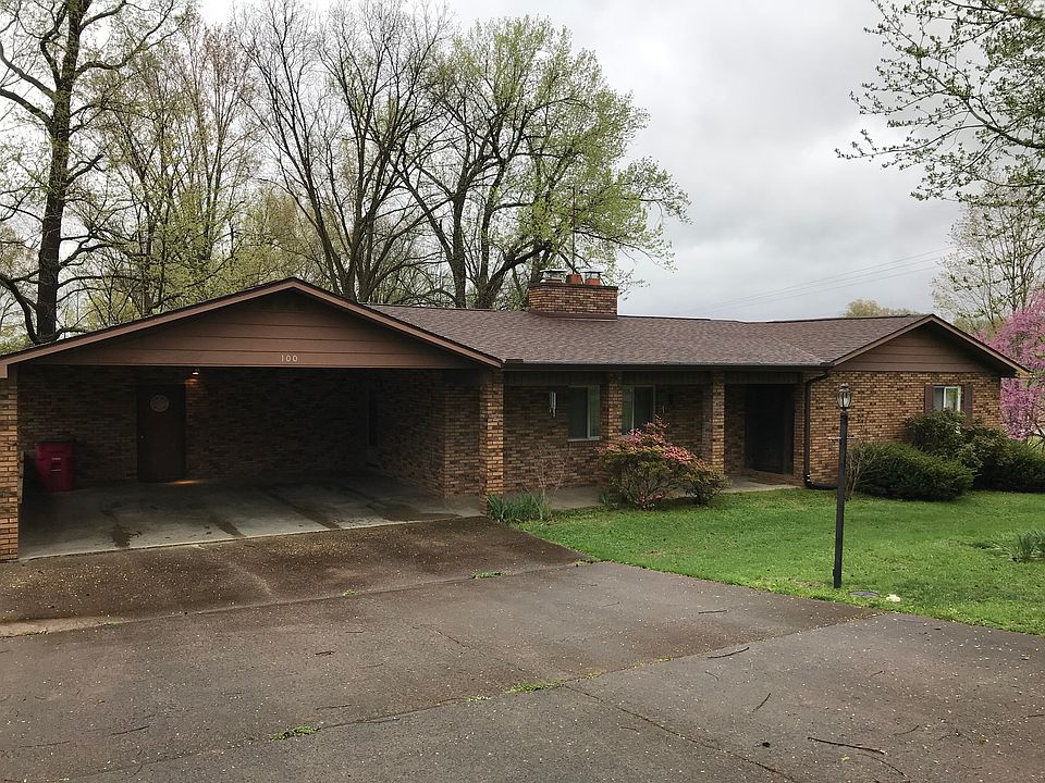 Brick ranch with carport
