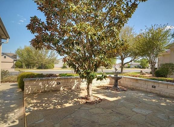 Kick back and read a book at the fun stone Courtyard, where a nicely-place magnolia tree adds evergreen charm.