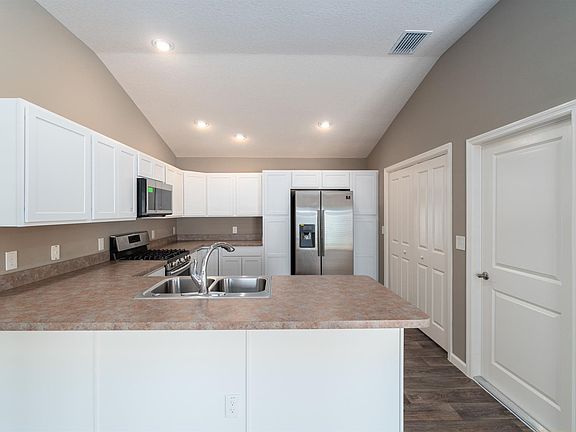 Kitchen with new stainless steel appliances and plenty of storage