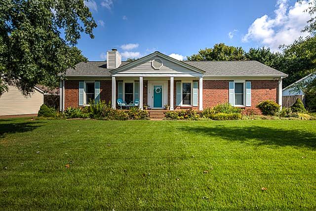 Brick Front w/Vinyl Exterior