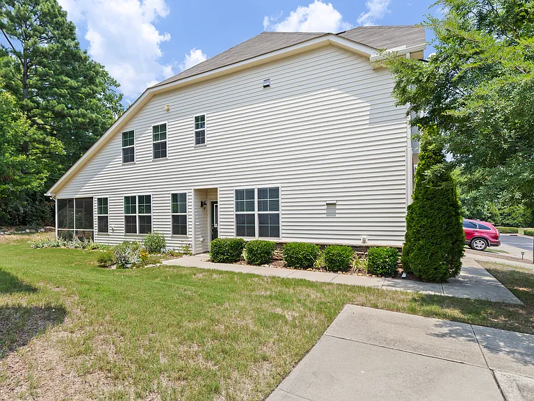 Private end-unit entrance with additional windows and natural light