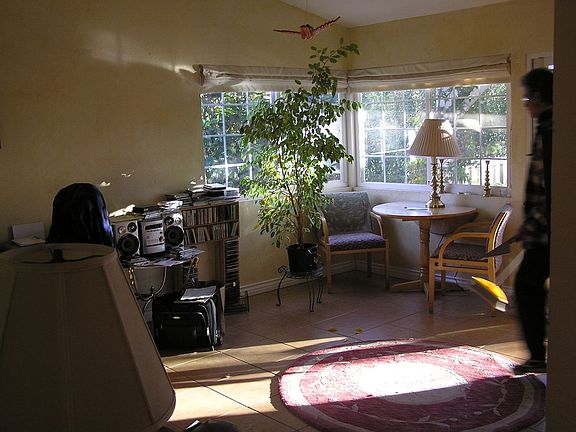 Family room with smooth ceilings and newer dual paine windows