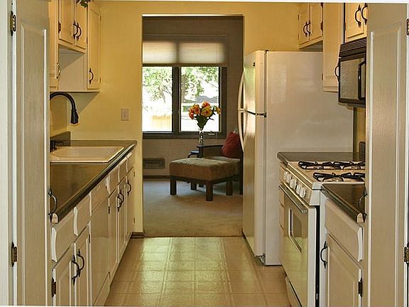 Enameled cabinetry, new countertops and fixtures