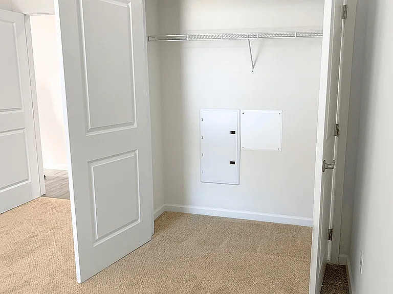 Spacious bedrooms featuring luxury carpeting, ample natural light, and spacious closets, creating a comfortable and stylish retreat.