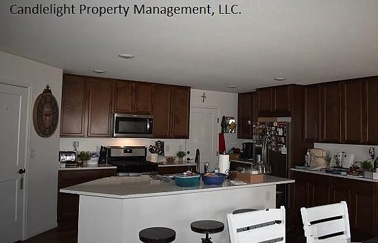 4th image of 21168 E 61st Dr