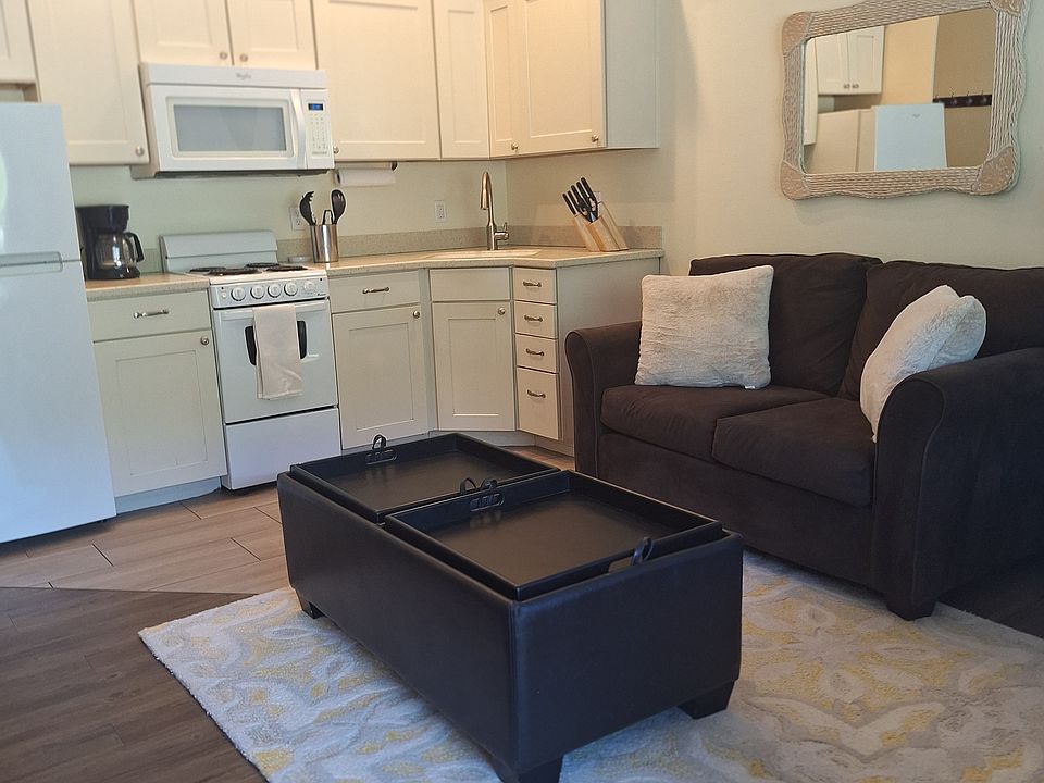 Loveseat and kitchen