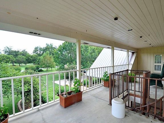 Another view of the upstairs veranda. There is also a storage room off the veranda - a great place to store yard decorations.