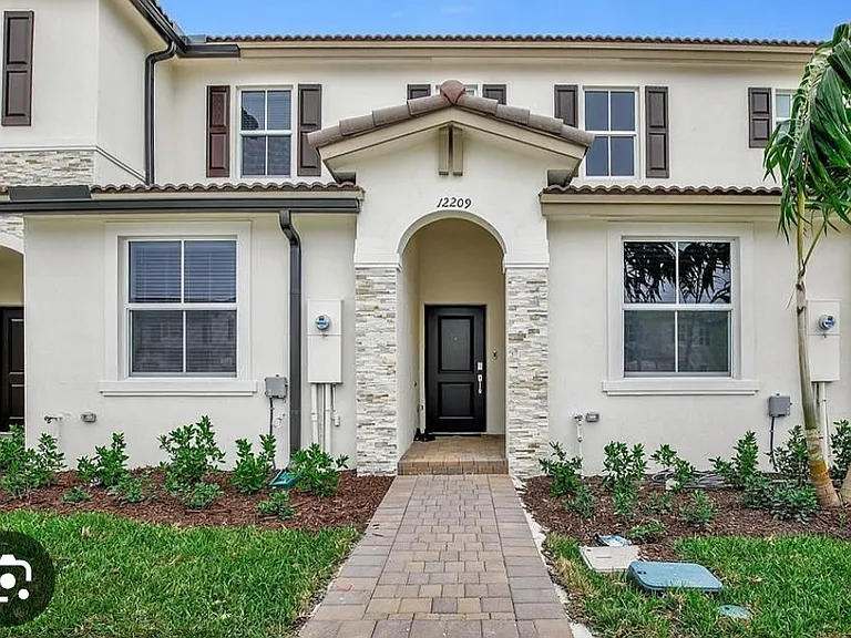 12209 NW 24th Pl — Photo 1