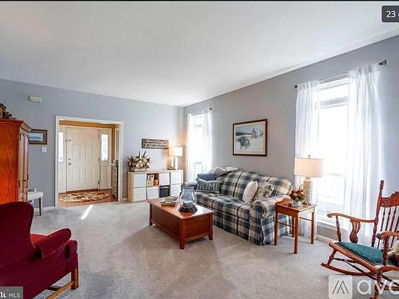 Flooring is newer than this pic and greige paint. See pic # 2