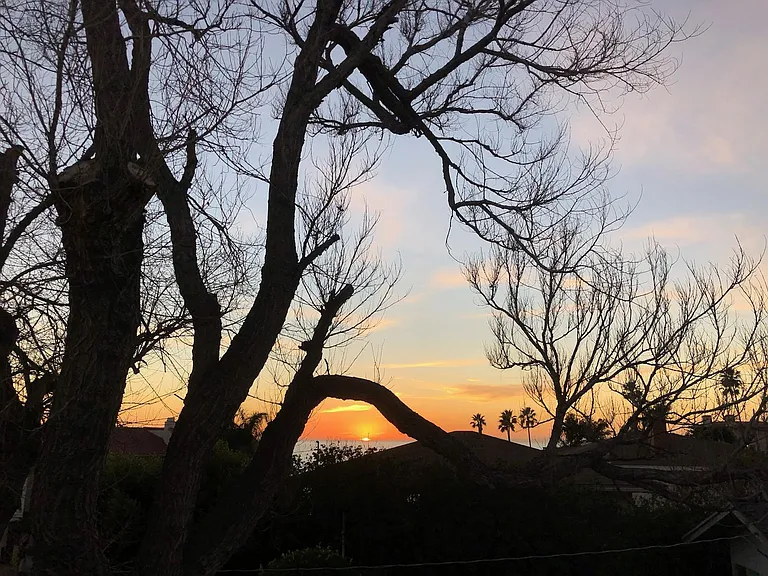 Sunset view from the balcony of this apartment.