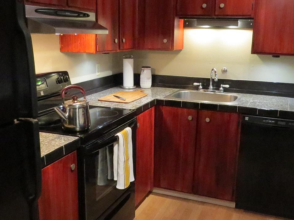 Kitchen with new appliances and granite countertops