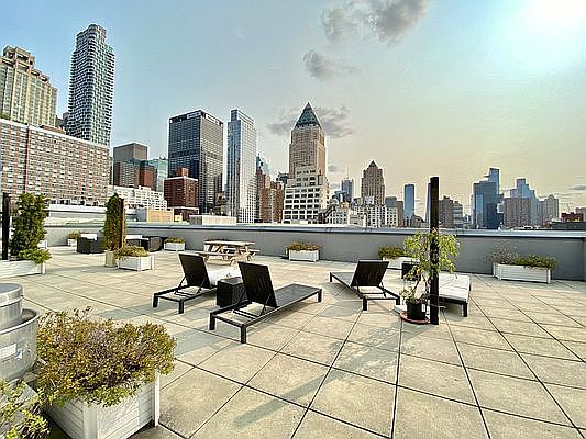 5th image of 351 W 54th St APT 2A