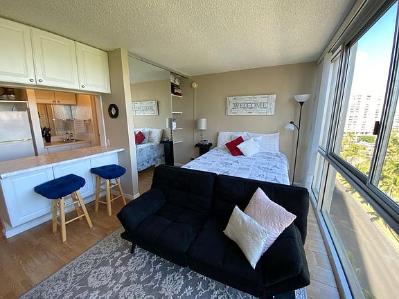 Futon couch folds down to a bed