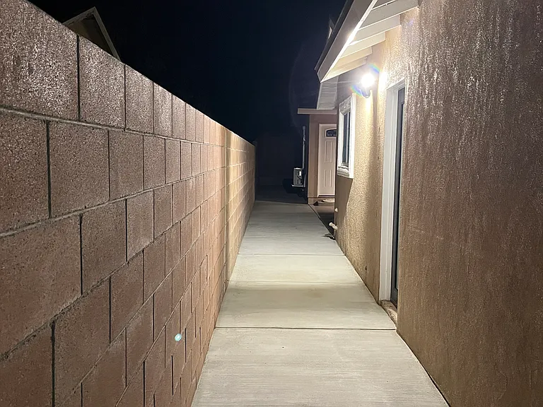 Motion sensor walk-way at night. Fully illuminates.