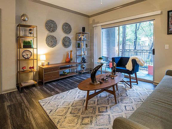 Apartment Living Room with wood floors.