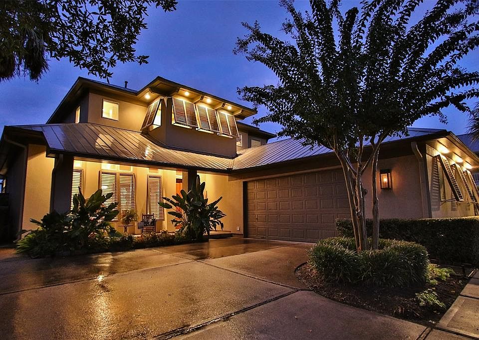 A beautiful custom built home sits on the water with lovely views and gulf breezes.