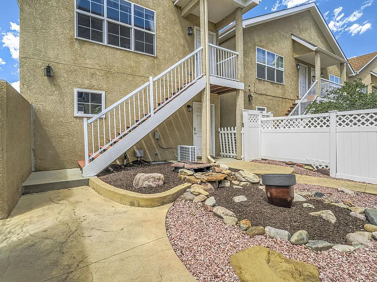Shared fenced in courtyard with two other units