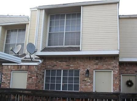 BACK OF HOME WITH PATIO