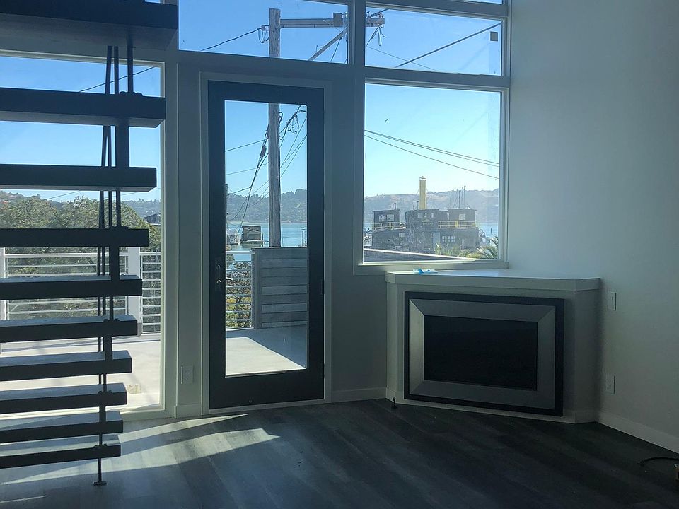 Living room with views of Sausalito Marina