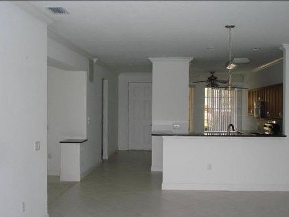 4th image of 12070 Matera Ln Unit 104