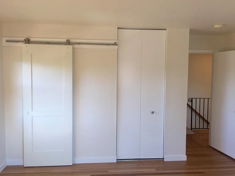 Primary Bathroom Closed Off - 1 of 2 Closets on Right