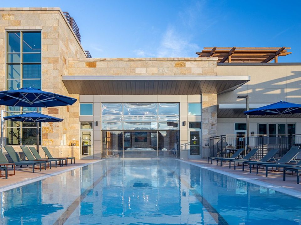 25-meter heated indoor / outdoor saltwater swimming pool with retractable glass wall