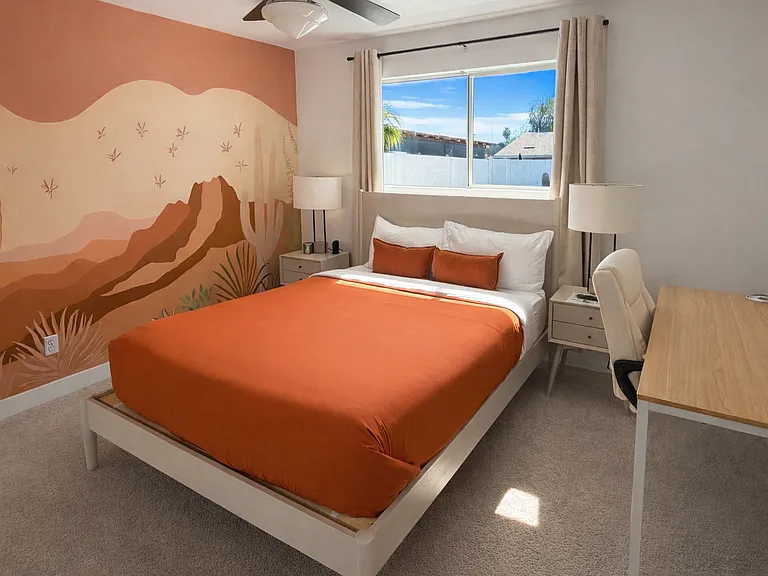 Primary Bedroom with Queen Bed, Ensuite Bathroom and Smart TV