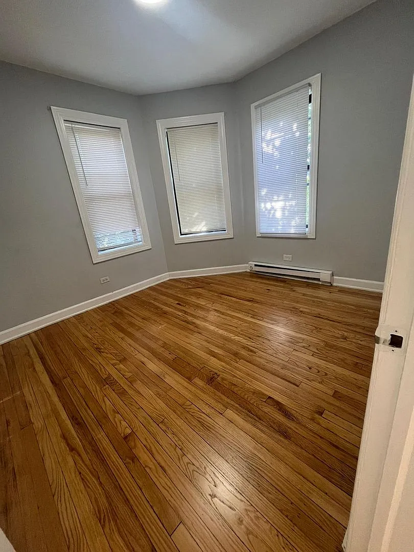 Building Photo - 7457 S Bennett Ave #4