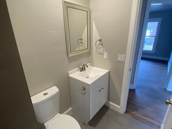 New Bath Cabinets and Toilet with New Tile