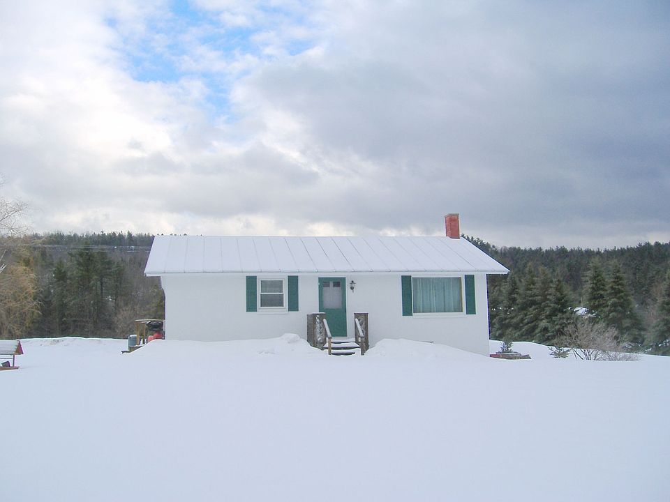 Front from road showing big front lawn