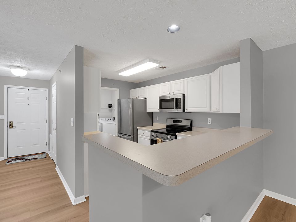 Granite Countertops have been installed after this photo was taken. New stainless appliances including microwave, stove, garbage disposal and refrigerator.