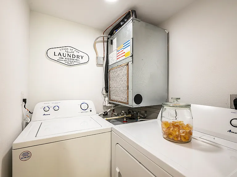 Laundry room with full-sized washer and dryer