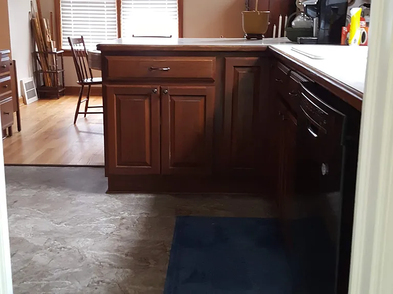 side entry looking into kitchen. Dining in back