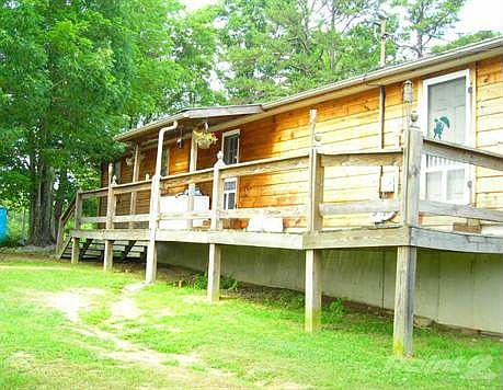 BACK OF HOUSE W/DECKS.