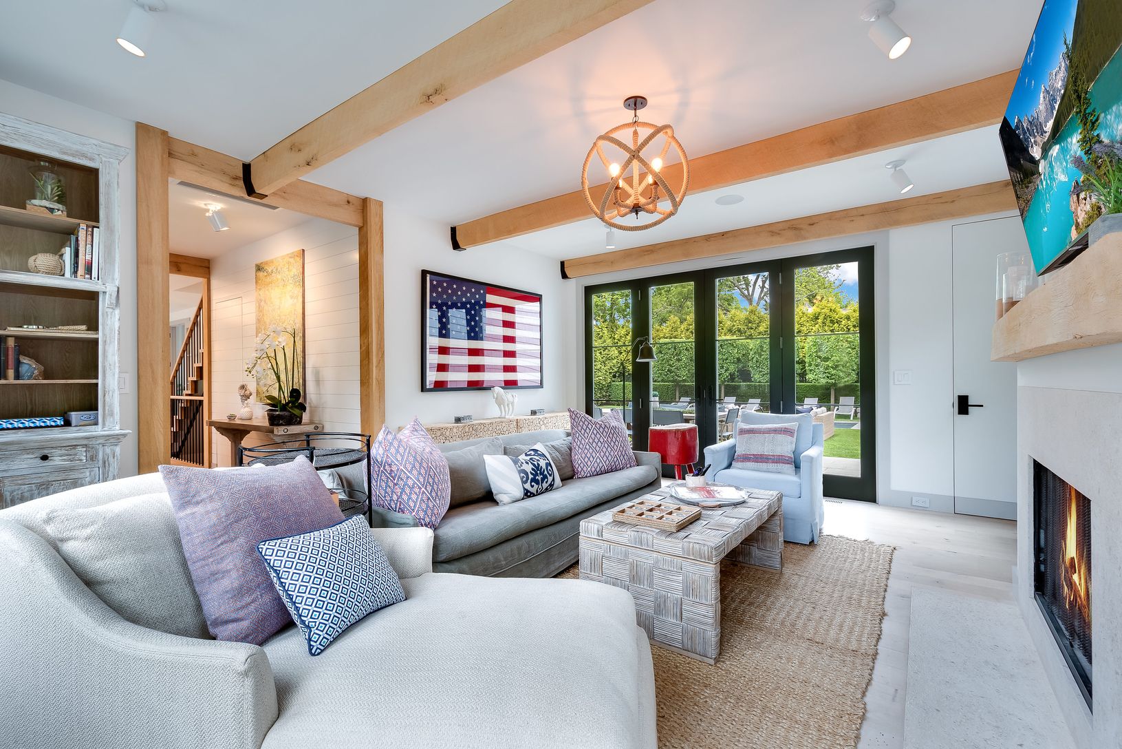  Den with fireplace opens on to deck and rear yard 